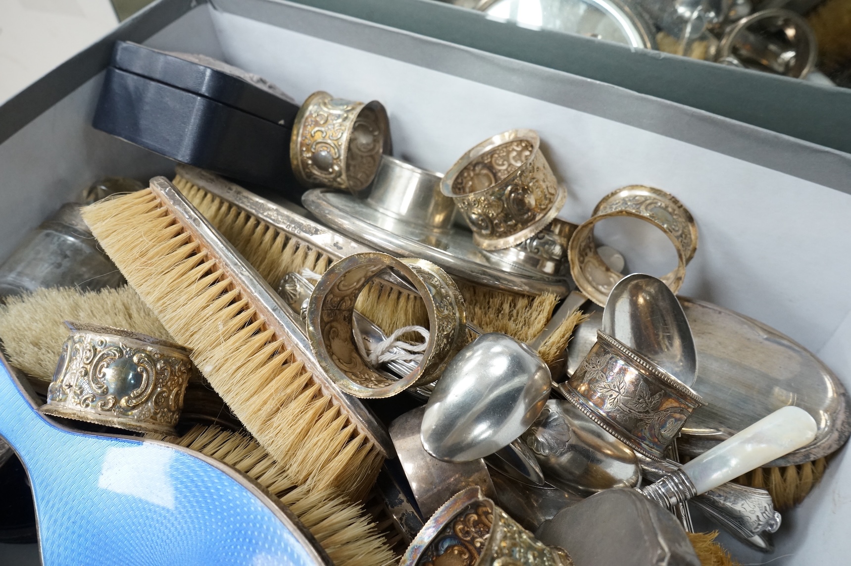 A quantity of assorted silver items including four silver and enamel clothes or hair brushes by Charles S. Green & Co Ltd, Birmingham, 1923, nine other mounted dressing table items, a Victorian christening trio, a set of